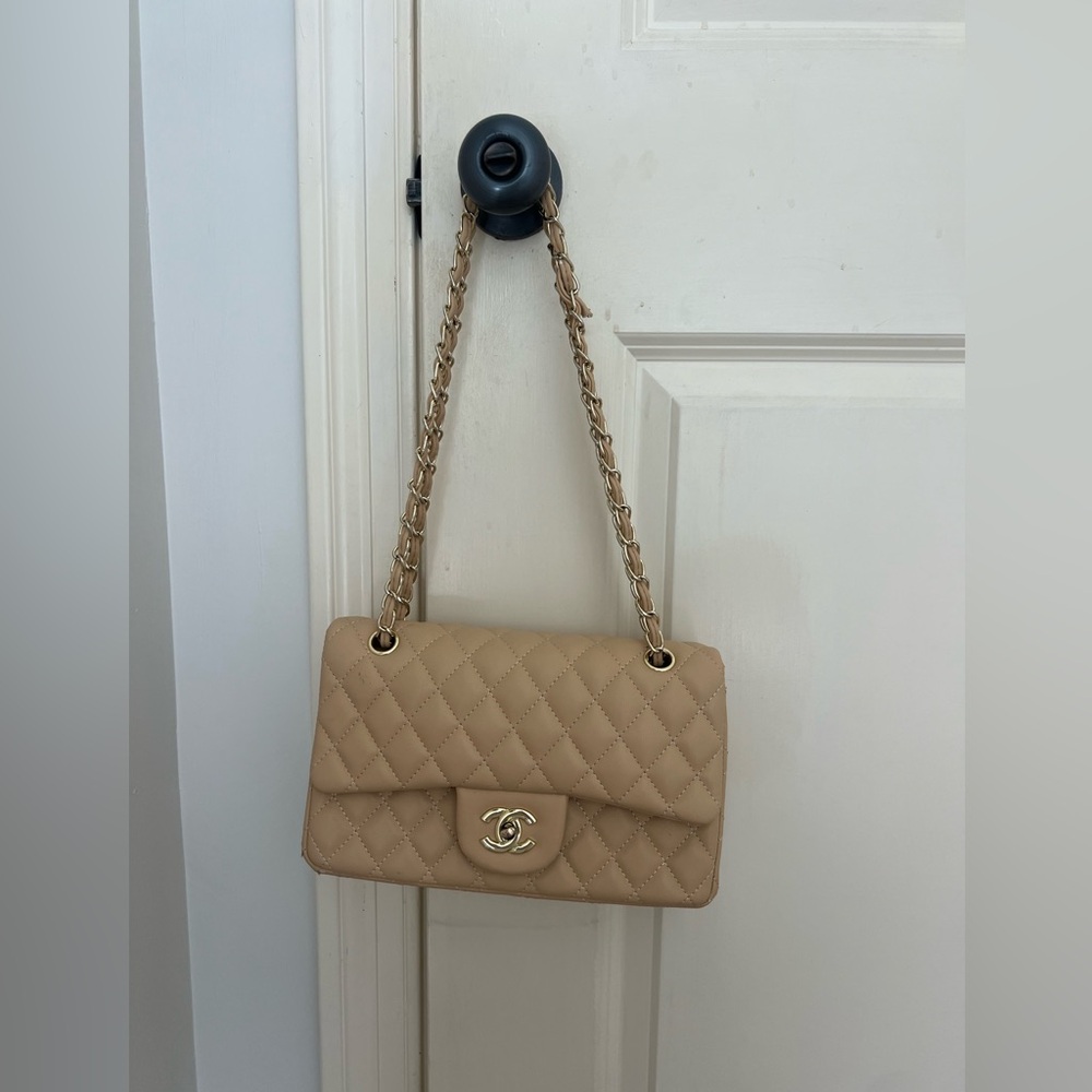 CHANEL jumbo flap beige Clair purse.